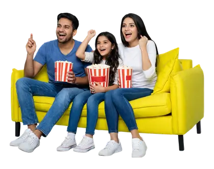 Indian Family Watching Tv in sofa